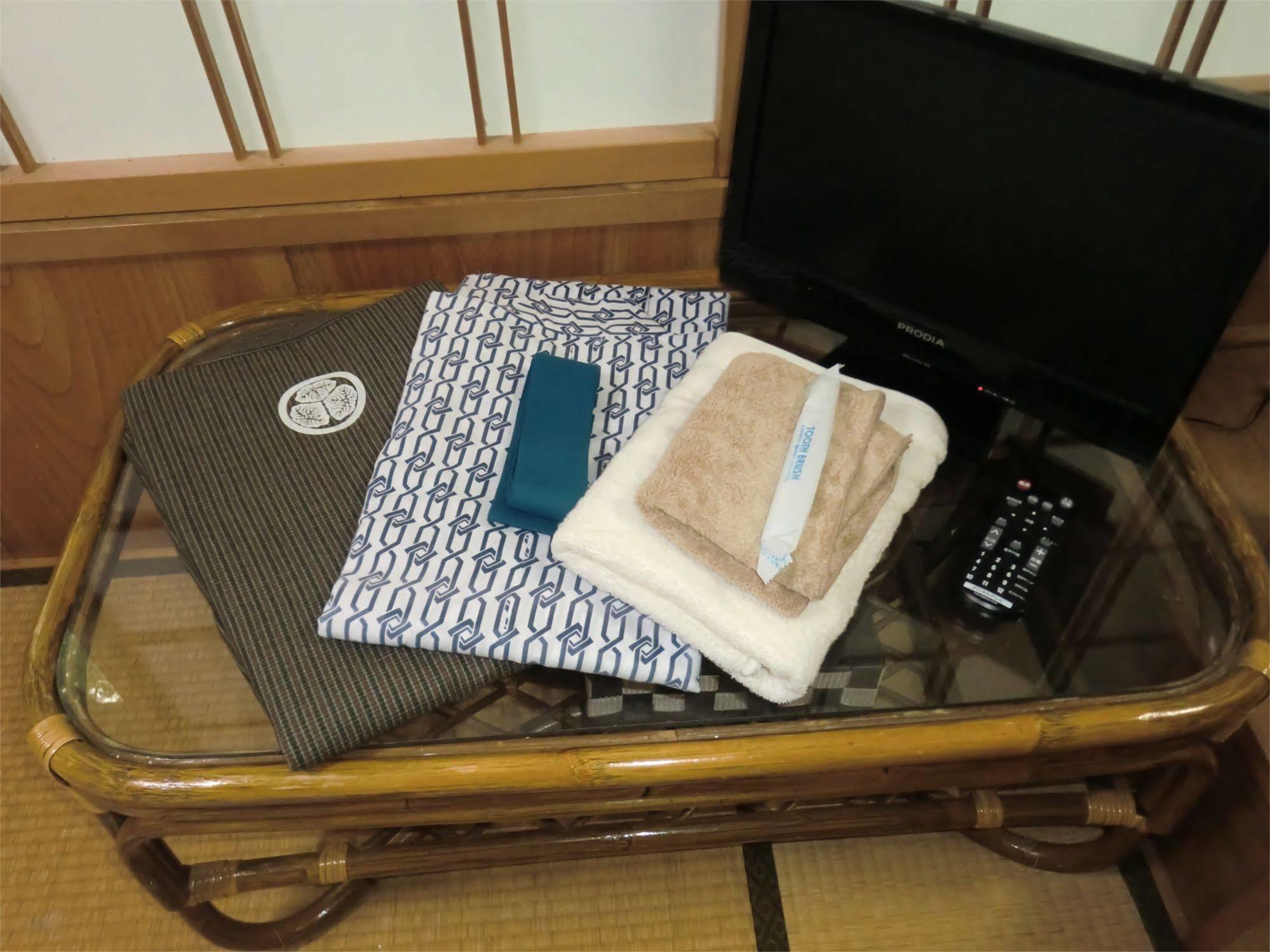 Готель Onsen Minshuku Sakaeya Shizukuishi Екстер'єр фото